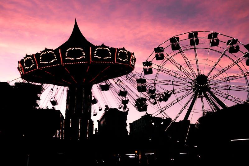 Amusement park rides at twilight