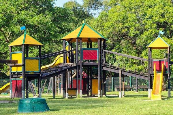 Family enjoying a country park adventure playground
