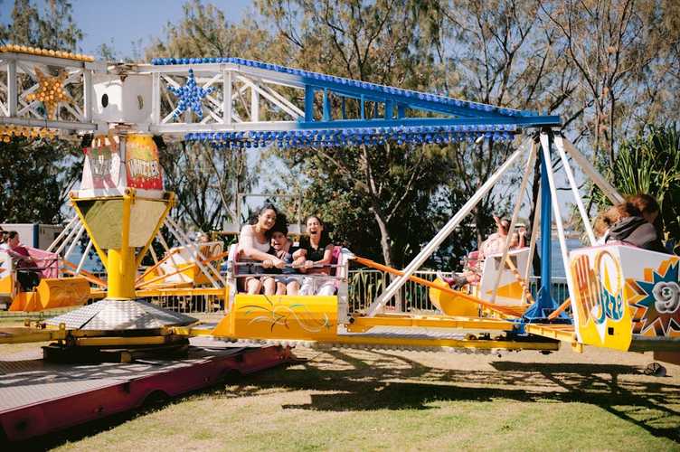 Family enjoying a day out at a theme park