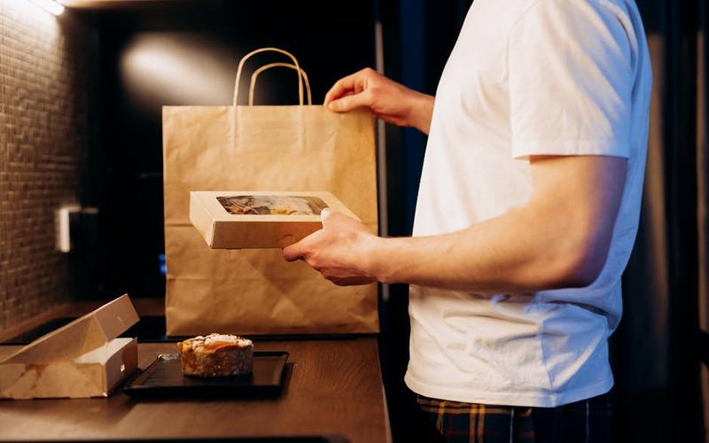 Meal kit subscription box with fresh ingredients ready to cook