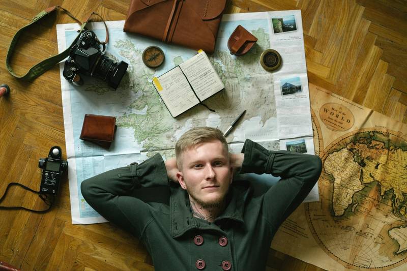 Travel essentials laid out showing money-saving packing