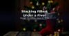 A red knitted Christmas stocking filled with small wrapped gifts, chocolate coins and a candy cane beside a decorated tree - budget stocking filler ideas under 5 pounds