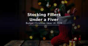 A red knitted Christmas stocking filled with small wrapped gifts, chocolate coins and a candy cane beside a decorated tree - budget stocking filler ideas under 5 pounds
