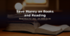 Stack of paperback books, reading lamp, cup of tea and pound coins on a dark table - budget reading in the UK